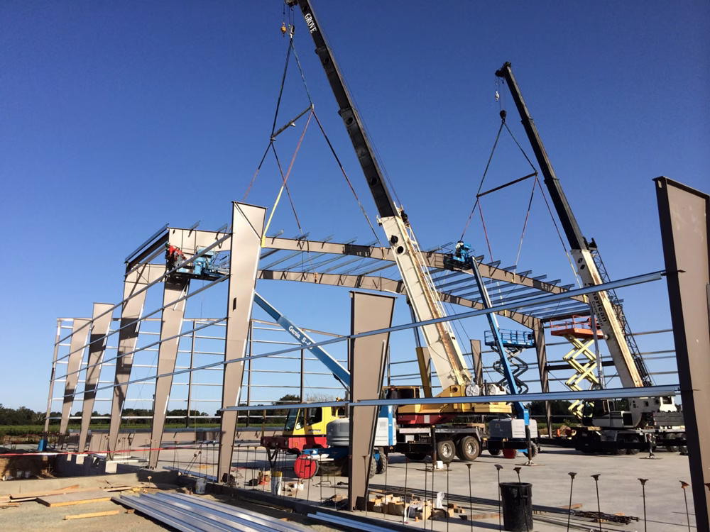 Commercial red iron steel building frame system for large warehouse and industrial metal buildings